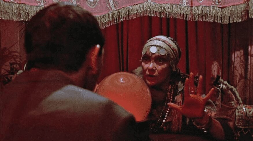 Fortune teller gazing into a crystal ball