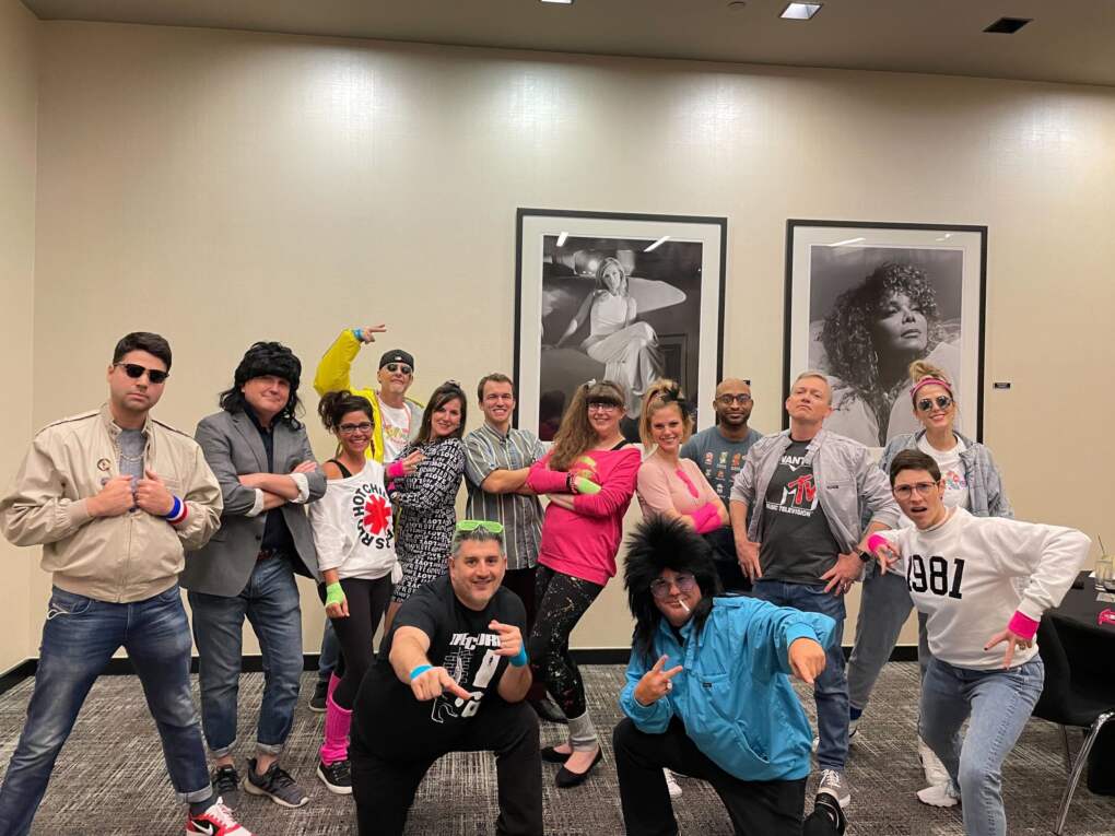 Hennessey Digital leaders in 80s gear