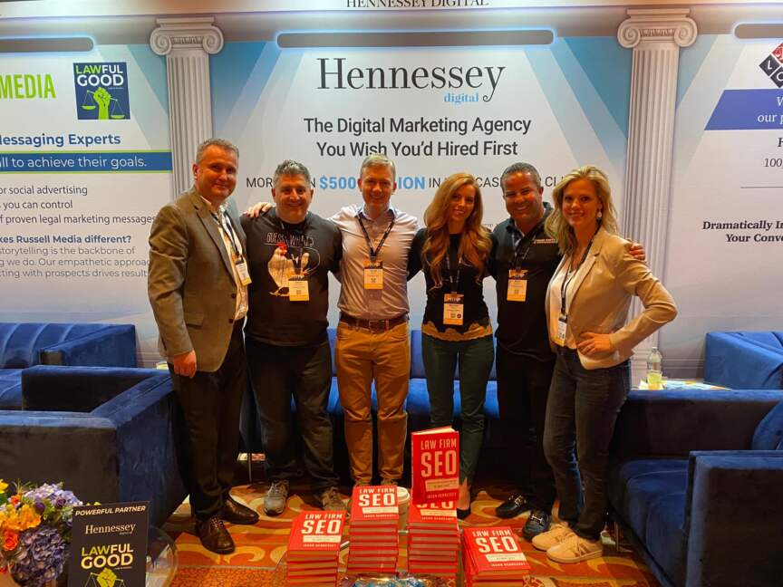 Hennessey Digital team at the company booth at Mass Torts Made Perfect, spring 2022