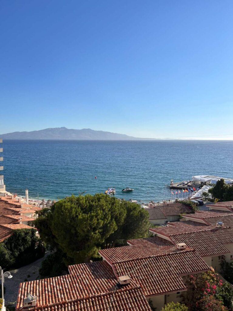 view from a rooftop overlooking water in Albania