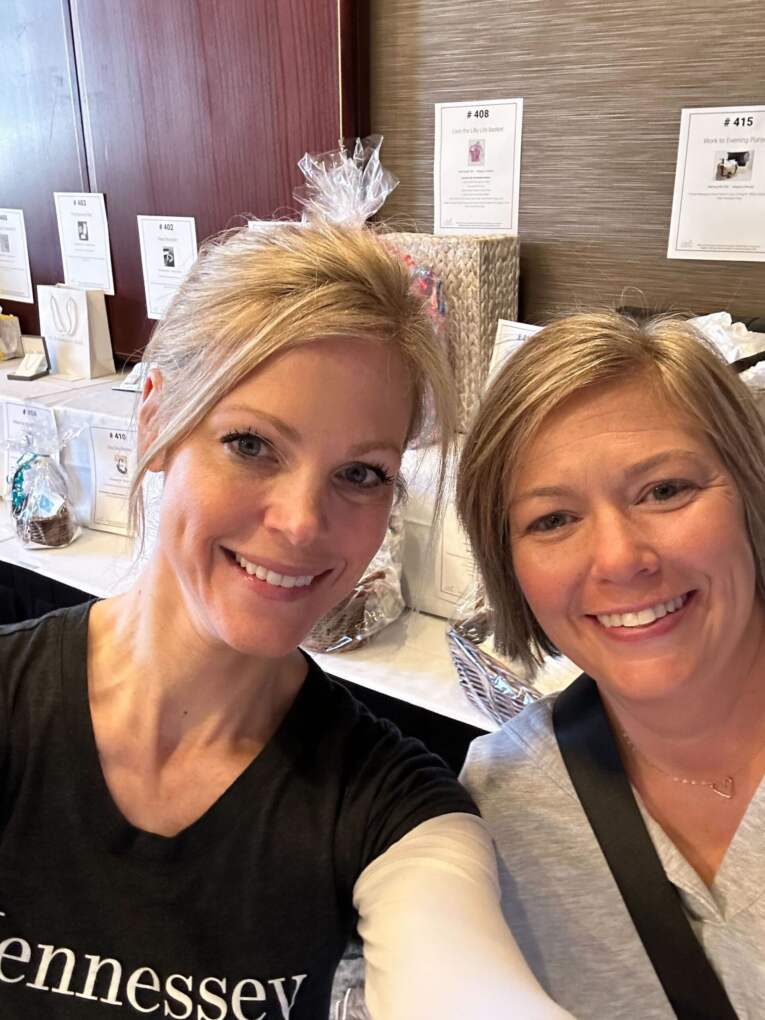Jill and a fellow volunteer at a charity event during RAK Week